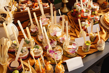 table with snacks. buffet. beautiful presentation of dishes for the holiday. 