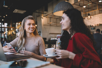 Women having break in cozy time cafe