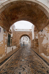 Fototapeta na wymiar Historical arch in Faro city