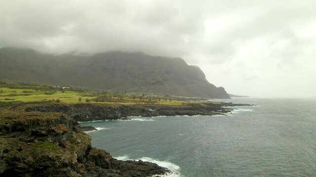 Tenerife, Buenavista del Nte. a town on the Atlantic Ocean. Sunny coast and golf course and banana plantation. Ocean, water, waves, blue ocean.