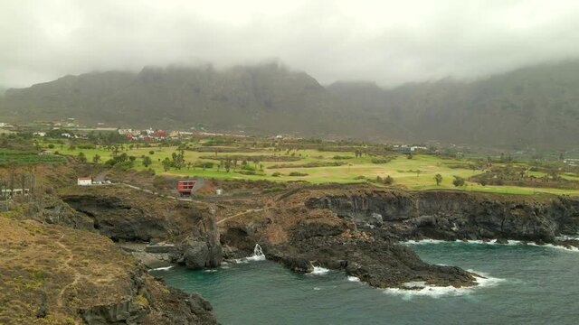 Tenerife, Buenavista del Nte. a town on the Atlantic Ocean. Sunny coast and golf course and banana plantation. Ocean, water, waves, blue ocean.