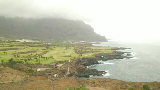 Tenerife, Buenavista del Nte. a town on the Atlantic Ocean. Sunny coast and golf course and banana plantation. Ocean, water, waves, blue ocean.