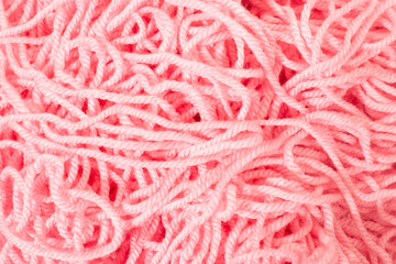 pink tangled knitting yarn