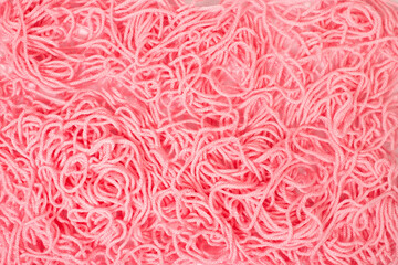 pink tangled knitting yarn