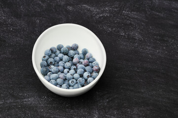 White Bowl of fresh wild blueberries