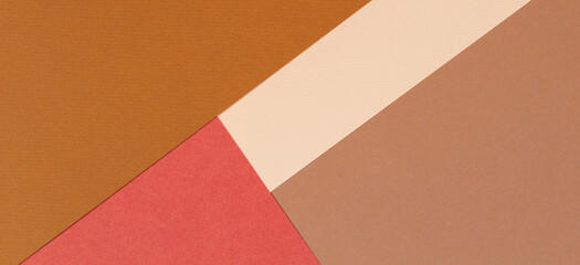 Abstract geometric paper background in earth tones. Beige, yellow, coral, brown colors background.