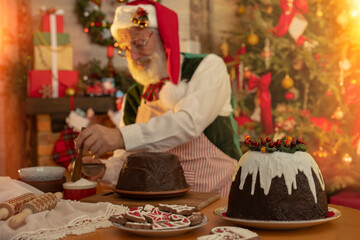 Grandpa cooking treat, gingerbread, pudding for Christmas Eve Party.