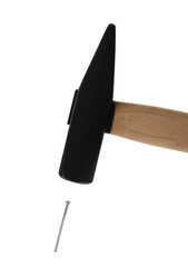 Hammer and metal nail on white background