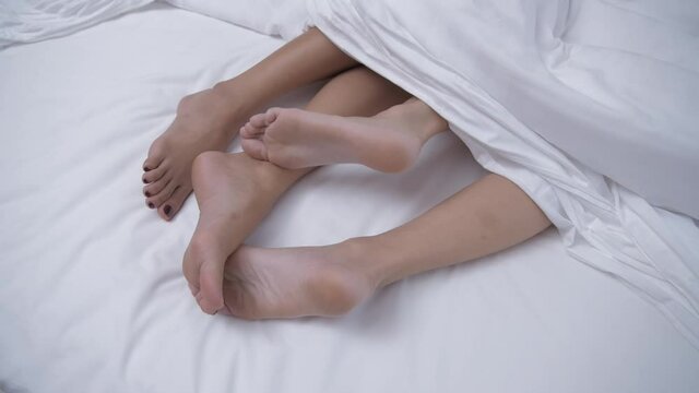 Health concept of 4k Resolution. The feet are moving on the bed.
