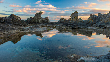 Fototapeta premium Folhammar i solens sista strålar