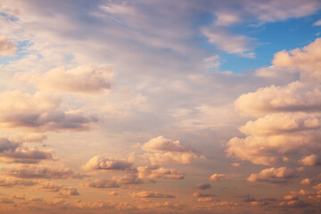 Naklejka na ściany i meble Sunset dramatic sky clouds with sunbeam