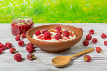 Fresh breakfast - oatmeal with raspberries