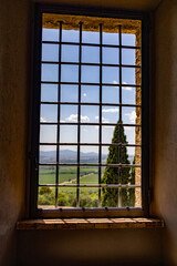 castle window view of the Tuscan countryside