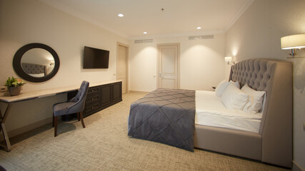 Interior of white and gray cozy bedroom