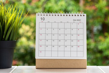 October 2021 desk calendar with potted plant