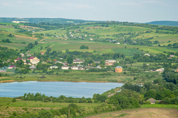 Obraz premium Beautiful summer landscape, pond in a village