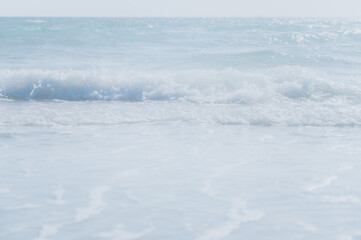 Ocean waves crashing on shore.