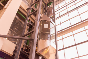 Glass elevator in a large shopping center.