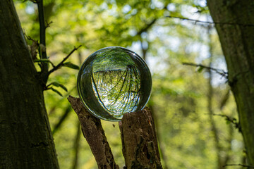 Crystal Photo Lens Magnifying Glass Spherical Ball showing an inverted upside-down image of...