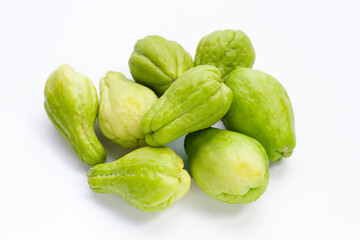 Fresh chayote fruit on white background.
