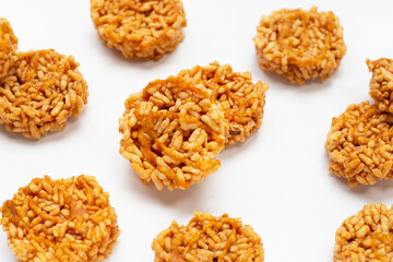 Rice cracker with coconut palm sugar on white