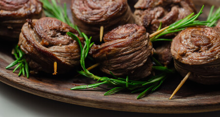 Juicy beef, fried and cooked in the shape of a rose, creatively served meat