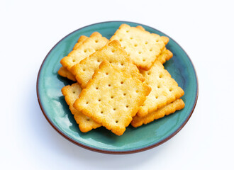 Dry cracker cookies on white background.