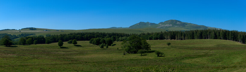 Panoramic view of the Sancy Puys Chain in summer. Auvergne, France