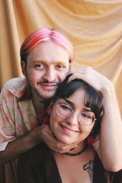 Soft lighting portrait of gender queer nonbinary friends couple together *2