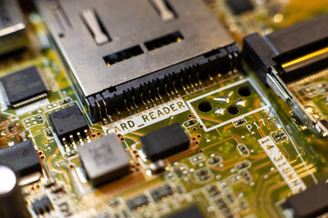 macro photography of electronic components on a board, sd card