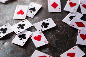 playing cards on a black