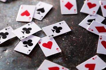 playing cards on a black