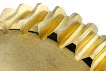 A macro photo of a new shiny copper gear, isolated on a white background.
