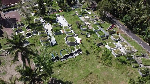 Bali, Indonesia - Drone Aerial Chinese Cemetery and Koncho Kongco Monastery The Oldest in Bali