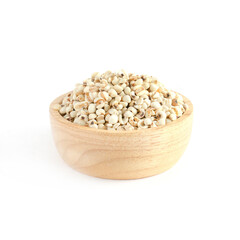 Closed up dry organic job's tear seed pile on wooden bowl on white background