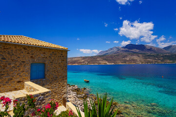 Scenic view from the picturesque seaside village Limeni. Traditional houses and colorful stoned buildings in Limeni, Mani area, Laconia, Greece