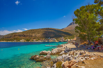 Fototapeta premium Scenic view from the picturesque seaside village Limeni. Traditional houses and colorful stoned buildings in Limeni, Mani area, Laconia, Greece