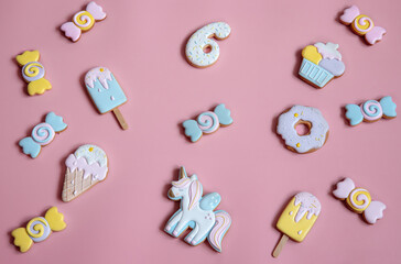 Colorful gingerbread cookies in colored glaze of different shapes.