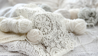 Fototapeta na wymiar Close-up of crochet threads and handmade products.