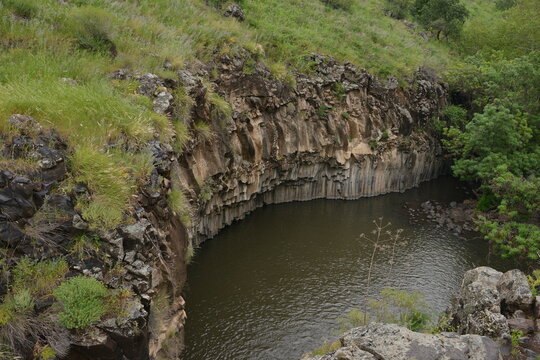 The Hexagon Pool is a natural pool in the Meshushim Reserve, in the central Golan Heights, Israel. The pool is named after the shape of the hexagonal basalt columns that that make up its walls