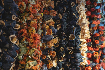 Dried vegetables hanging vertical in Istanbul ‘s Egyptian (Spice) Bazaar - Mısır Çarşısı. selective focus.