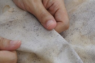 Saliva stains and black mold on pillows that have been dried in the sun on a hot day. Dirty pillows...
