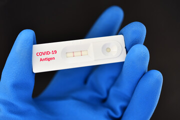 COVID-19 positive test result by using COVID-19 antigen test kit, rapid test method 