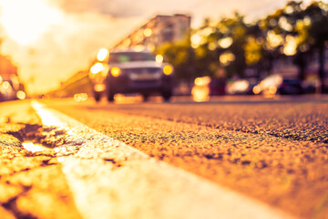 Sunny day in a city, after the earthquake damaged the asphalt, the view from the ground level