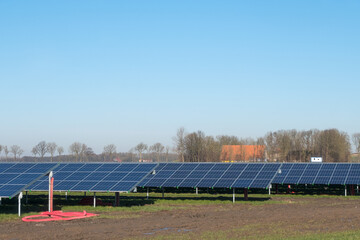 Solar panels on farmland near Emmeloord, Noordoostpolder, Flevoland Province, The Netherlands