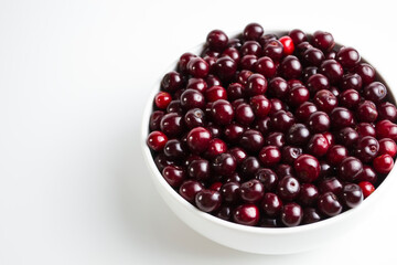 Cherry on a white background, juicy cherry for a photo wallpaper in your kitchen.