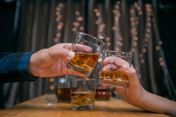 Celebrate whiskey on a friendly party in restaurant