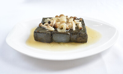 braised home made charcoal bean curd tofu with mushroom in oyster sauce in white background asian halal menu