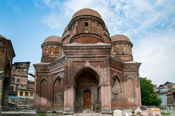 Graves surround the Tomb of Budshah, a popular tourist attraction in Srinagar, Kashmir, India.