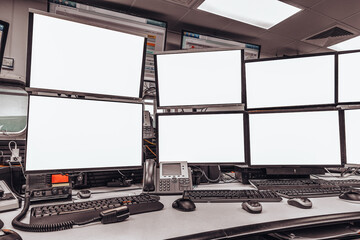 group of blank monitors and screen on security desk or control room for monitor process or stock data trading